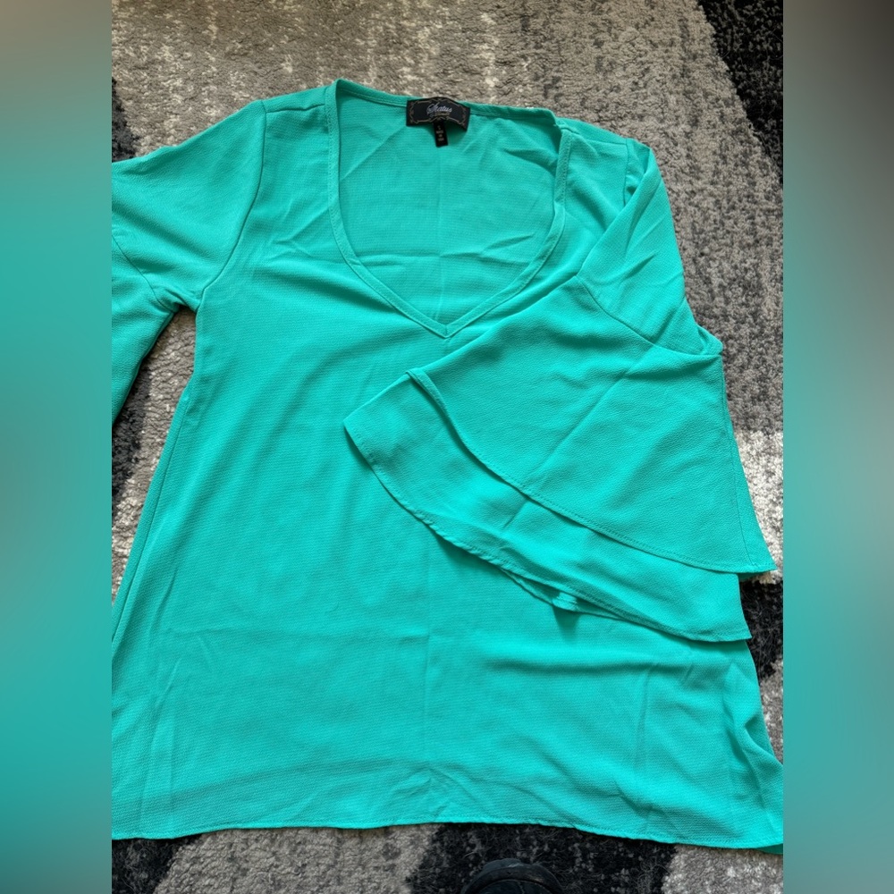 Status blouse.